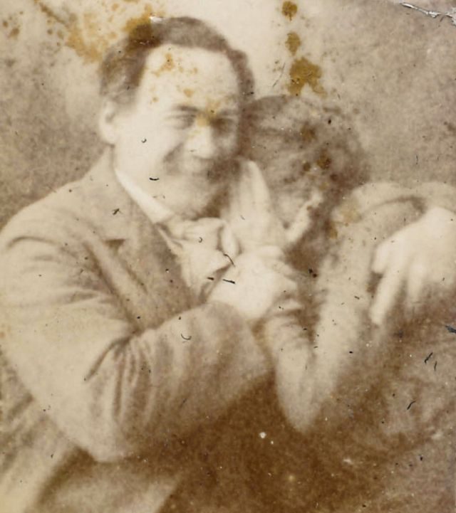"Photo booth couple break into laughter" by simpleinsomnia is licensed under CC BY 2.0.